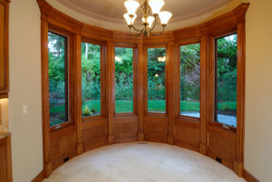 An alcove of a home with a beautiful bow window structure